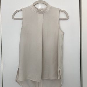 Ann Taylor crème mock neck tank. Work appropriate. Size XS. Mild wear.
